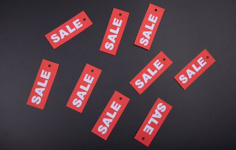 Sale signs on a black background